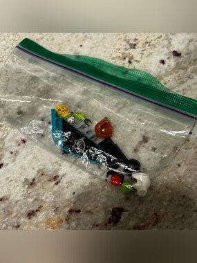 LEGO Styled Black and Teal Mini Figure with Accessories